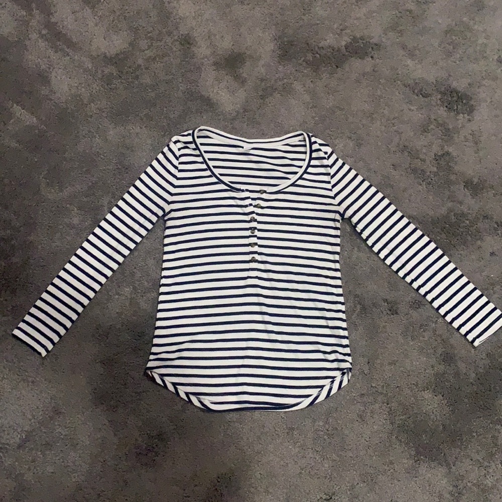Navy blue and white striped knit shirt